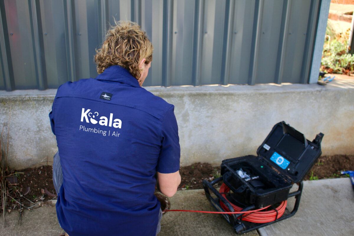 Koala Plumbing qualified trade conducting a CCTV drain camera inspection